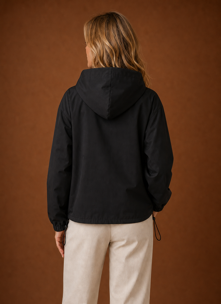 Lightweight hooded windbreaker jacket for women, perfect for versatile outdoor wear, featuring a stylish design and breathable fabric ideal for various weather conditions. 3