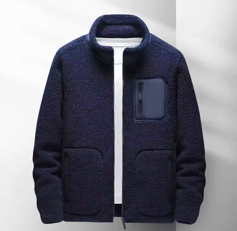 Men's fleece zip-up jacket with high collar, perfect for casual wear, featuring a sleek design and comfortable fit in a versatile color. 0