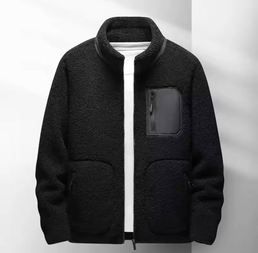 Men's fleece zip-up jacket with high collar, perfect for casual wear, featuring a sleek design and comfortable fit in a versatile color. 1