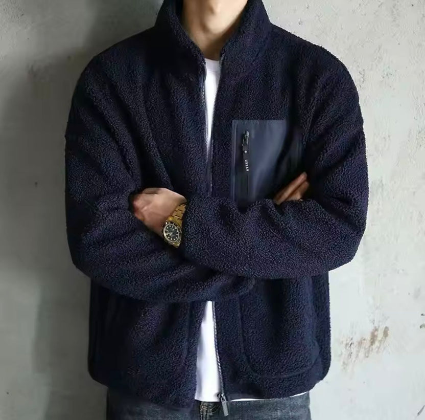 Men's fleece zip-up jacket with high collar, perfect for casual wear, featuring a sleek design and comfortable fit in a versatile color. 4