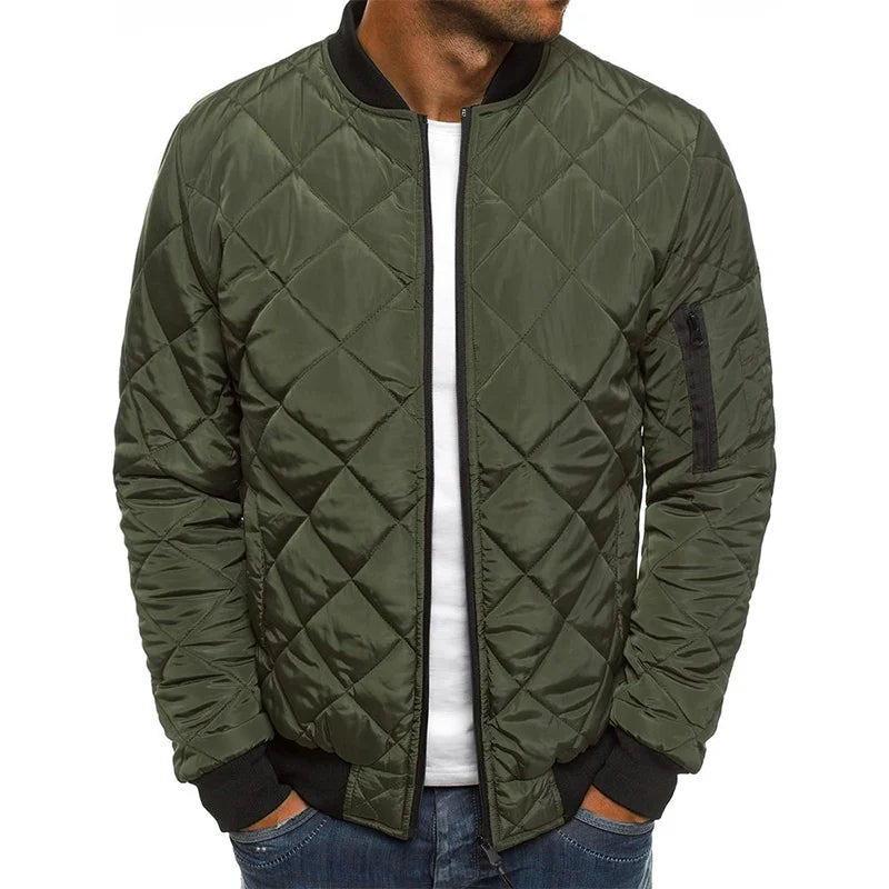 Men's quilted bomber jacket featuring ribbed trim and a zip pocket, perfect for stylish warmth and functionality. 0