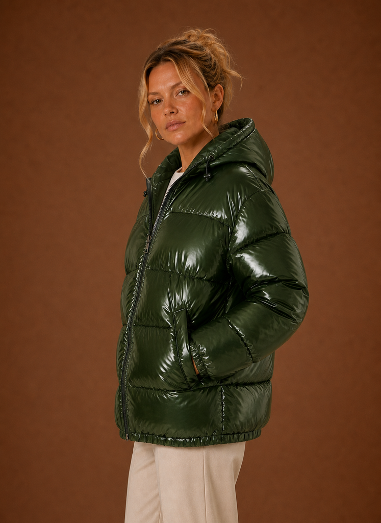 Oversized women's black puffer jacket designed for winter warmth and comfort, featuring a stylish and cozy silhouette with a spacious fit. 5