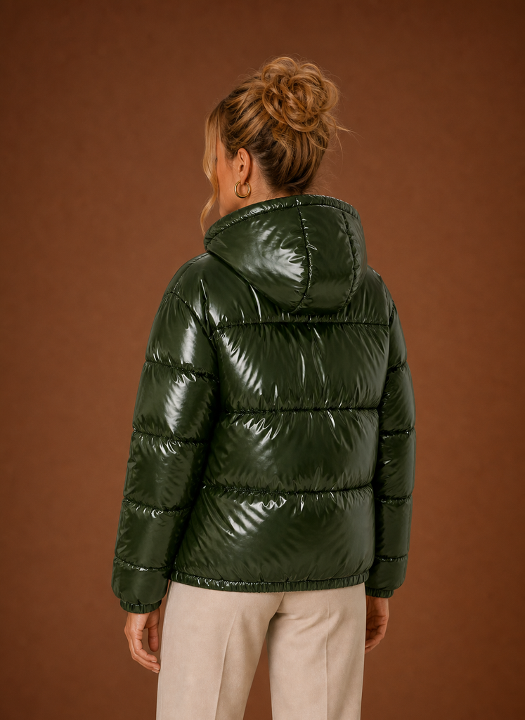 Oversized women's black puffer jacket designed for winter warmth and comfort, featuring a stylish and cozy silhouette with a spacious fit. 6