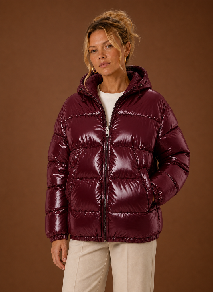 Oversized women's black puffer jacket designed for winter warmth and comfort, featuring a stylish and cozy silhouette with a spacious fit. 8