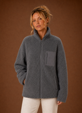 Women's casual sherpa zip-up jacket featuring a relaxed fit, perfect for layering in chilly weather. 0