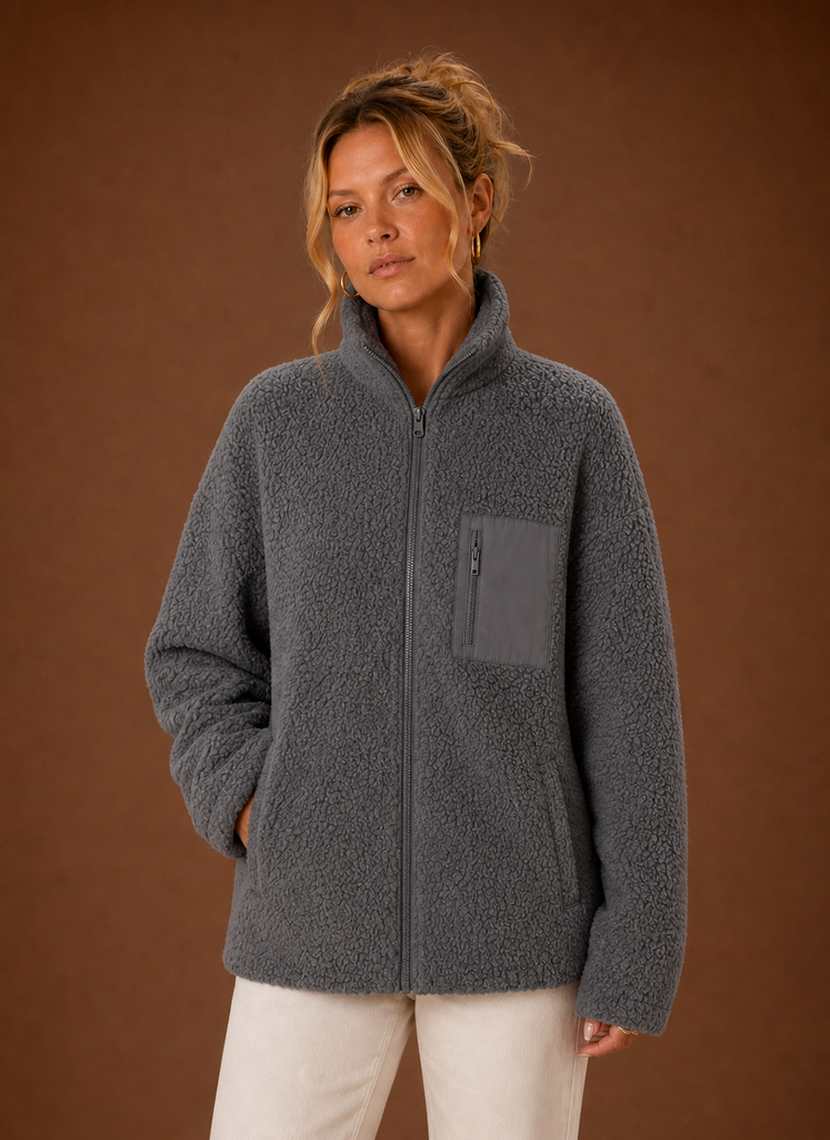 Women's casual sherpa zip-up jacket featuring a relaxed fit, perfect for layering in chilly weather. 0