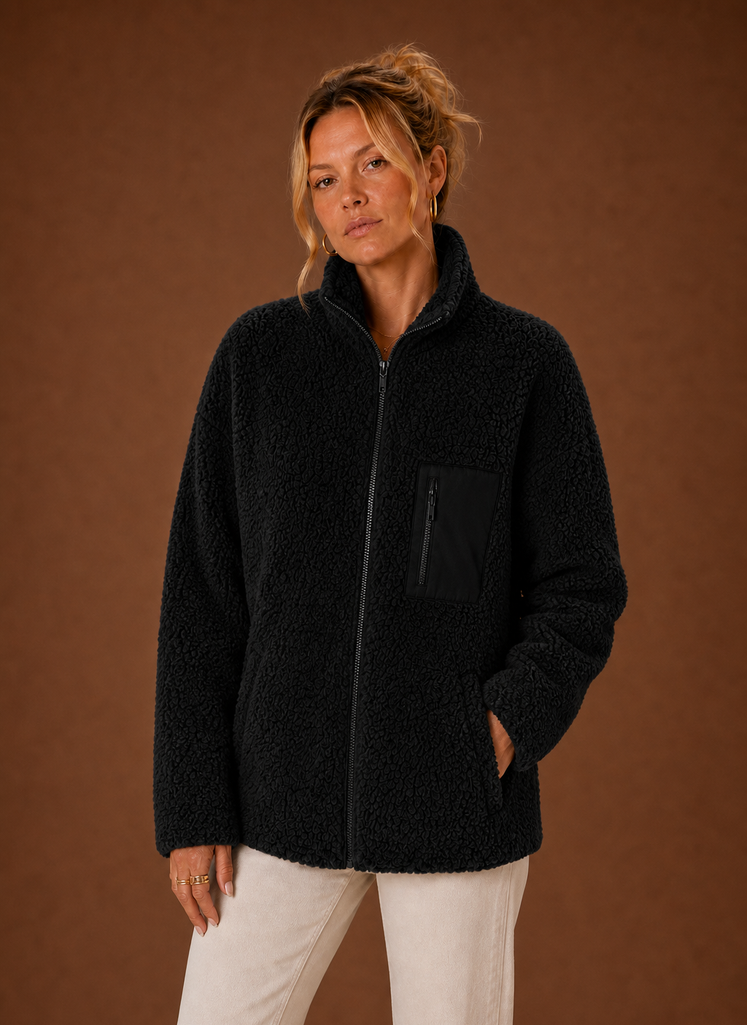Women's casual sherpa zip-up jacket featuring a relaxed fit, perfect for layering in chilly weather. 2