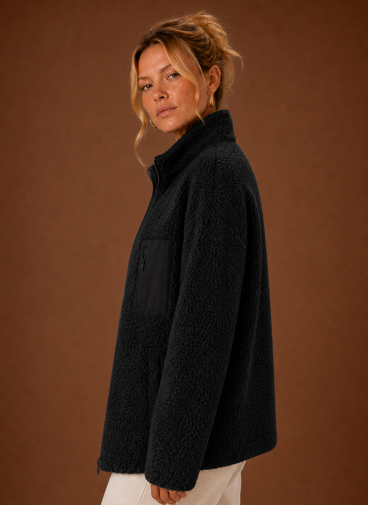 Women's casual sherpa zip-up jacket featuring a relaxed fit, perfect for layering in chilly weather. 7