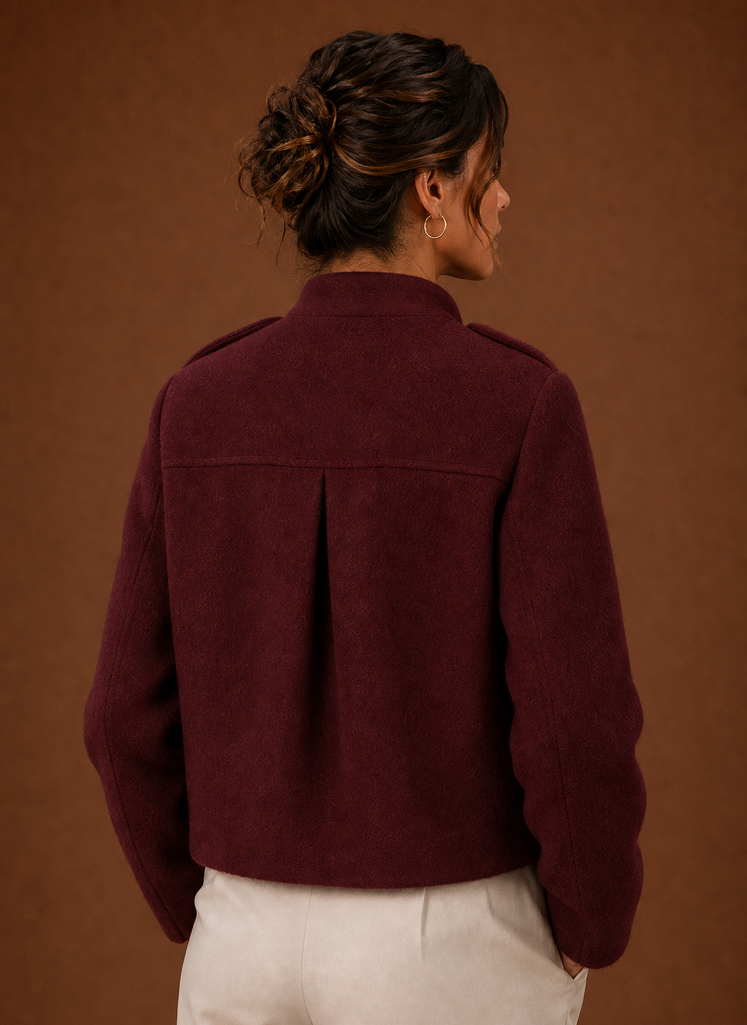 Women's cropped button-front jacket featuring a tailored fit, designed for a stylish and modern look, perfect for layering over casual or formal outfits. 5
