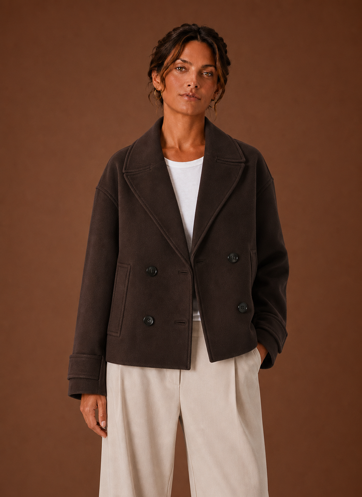 Women's double-breasted cropped coat featuring a stylish wide lapel, perfect for adding a chic touch to any outfit. 0