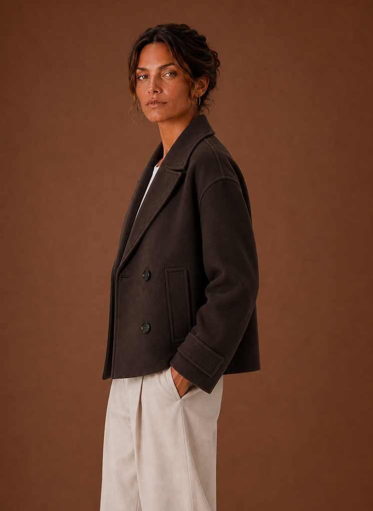 Women's double-breasted cropped coat featuring a stylish wide lapel, perfect for adding a chic touch to any outfit. 1