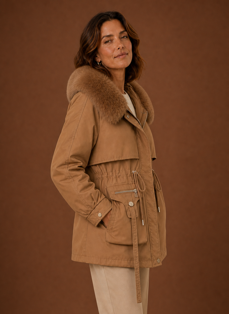 Women's hooded parka jacket featuring a stylish faux fur trim, perfect for winter warmth and fashion. 1
