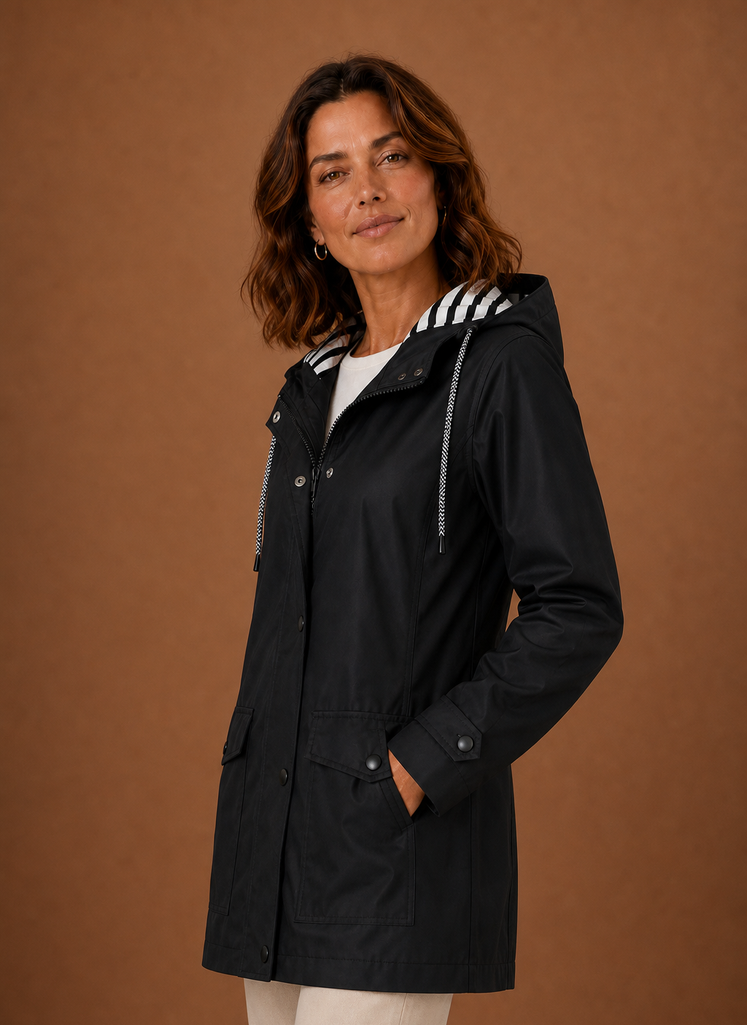 Women's hooded trench coat featuring a tailored fit, designed for warmth and style during autumn and winter seasons. 1