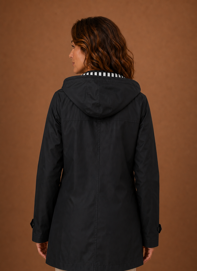 Women's hooded trench coat featuring a tailored fit, designed for warmth and style during autumn and winter seasons. 2