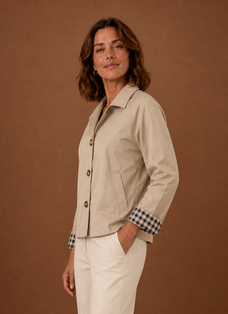 Women's lightweight button-front jacket featuring a relaxed fit, perfect for casual outings or layering in transitional weather. 2