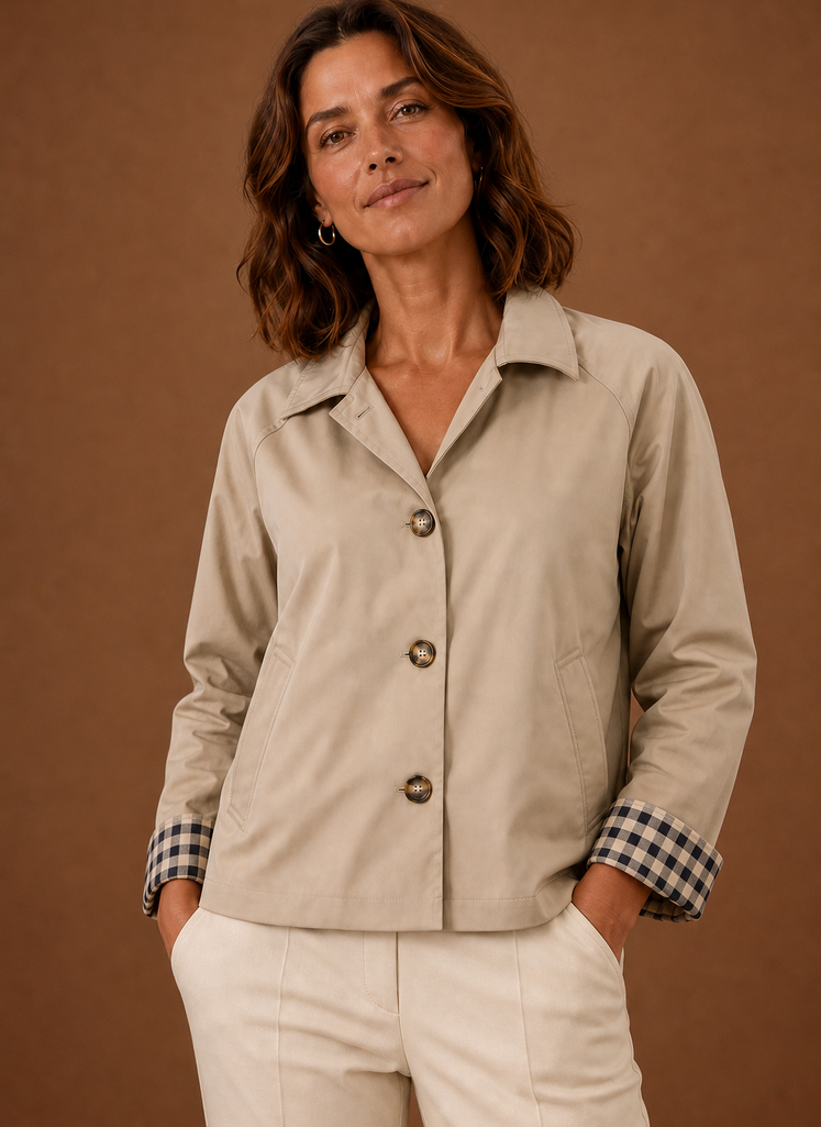 Women's lightweight button-front jacket featuring a relaxed fit, perfect for casual outings or layering in transitional weather. 3