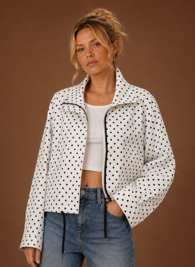 Women's lightweight polka dot jacket featuring an adjustable hem for a customizable fit, perfect for stylish layering in any season. 0