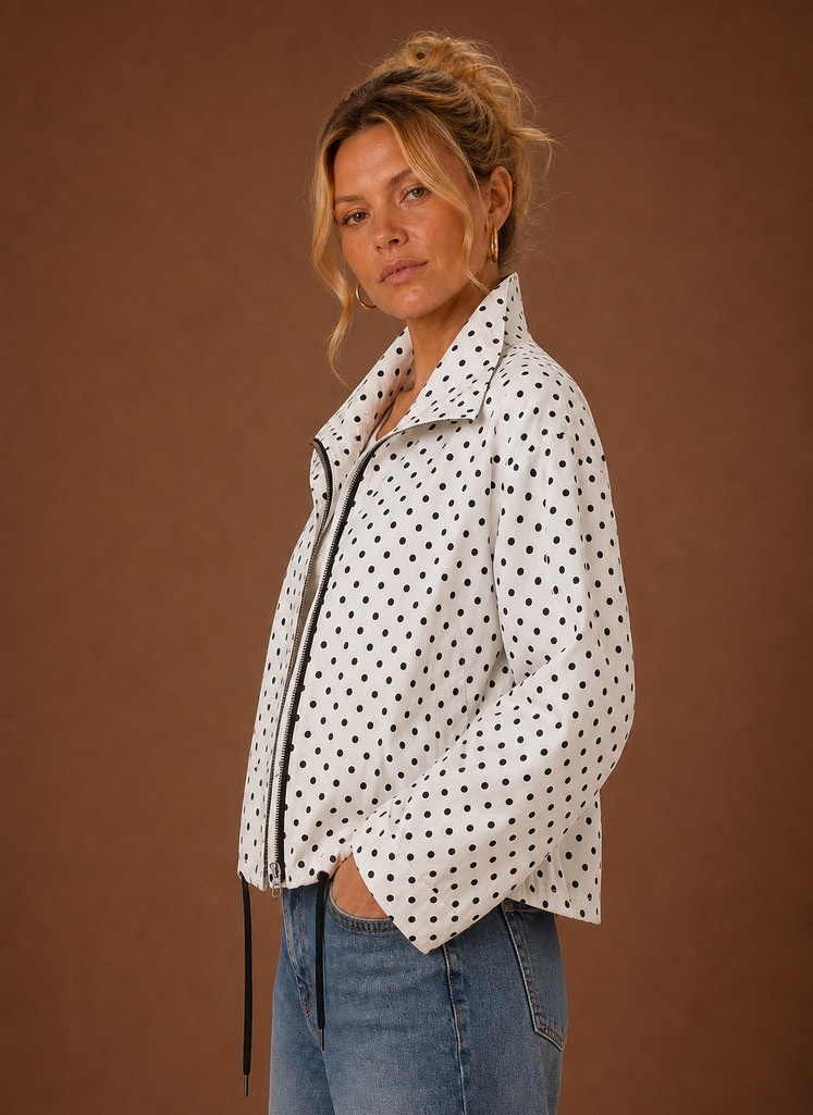 Women's lightweight polka dot jacket featuring an adjustable hem for a customizable fit, perfect for stylish layering in any season. 2