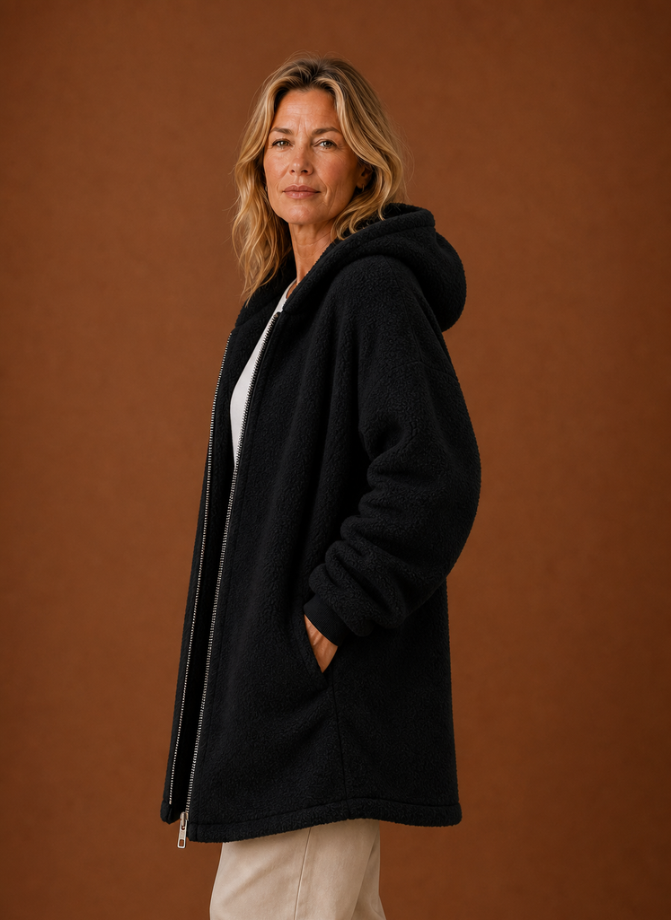 Women's long fleece hooded jacket featuring a zip closure and spacious pockets, perfect for staying warm and stylish in cold weather. 3