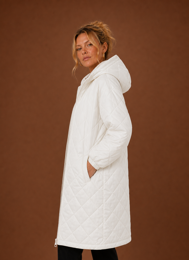 Women's long quilted hooded winter coat featuring a relaxed fit, designed for warmth and comfort during cold weather. 4