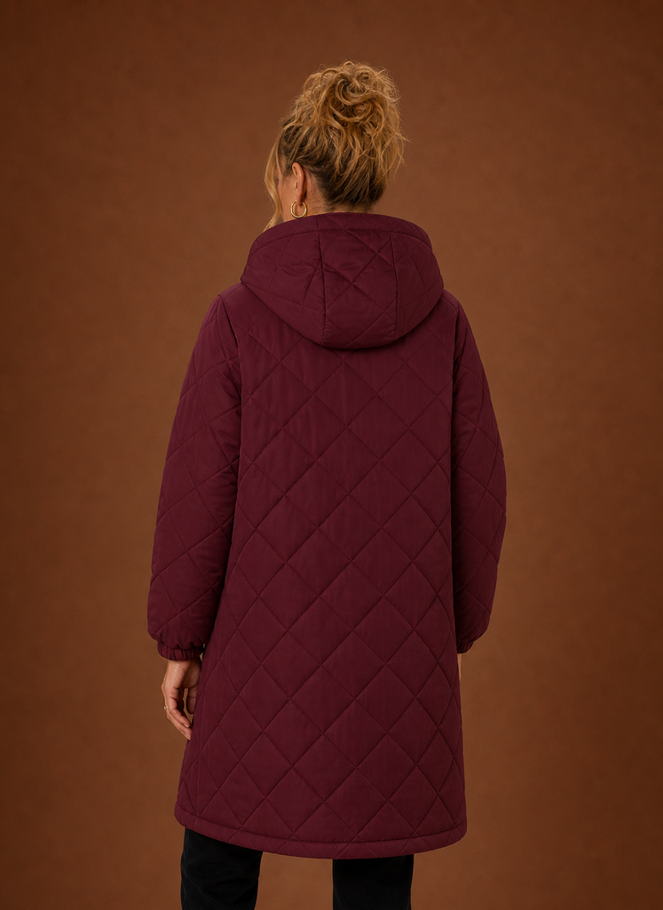 Women's long quilted hooded winter coat featuring a relaxed fit, designed for warmth and comfort during cold weather. 7