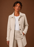 Women's mid-length button front trench coat in a stylish beige color, featuring a belted waist, classic collar, and dual side pockets, perfect for both 0