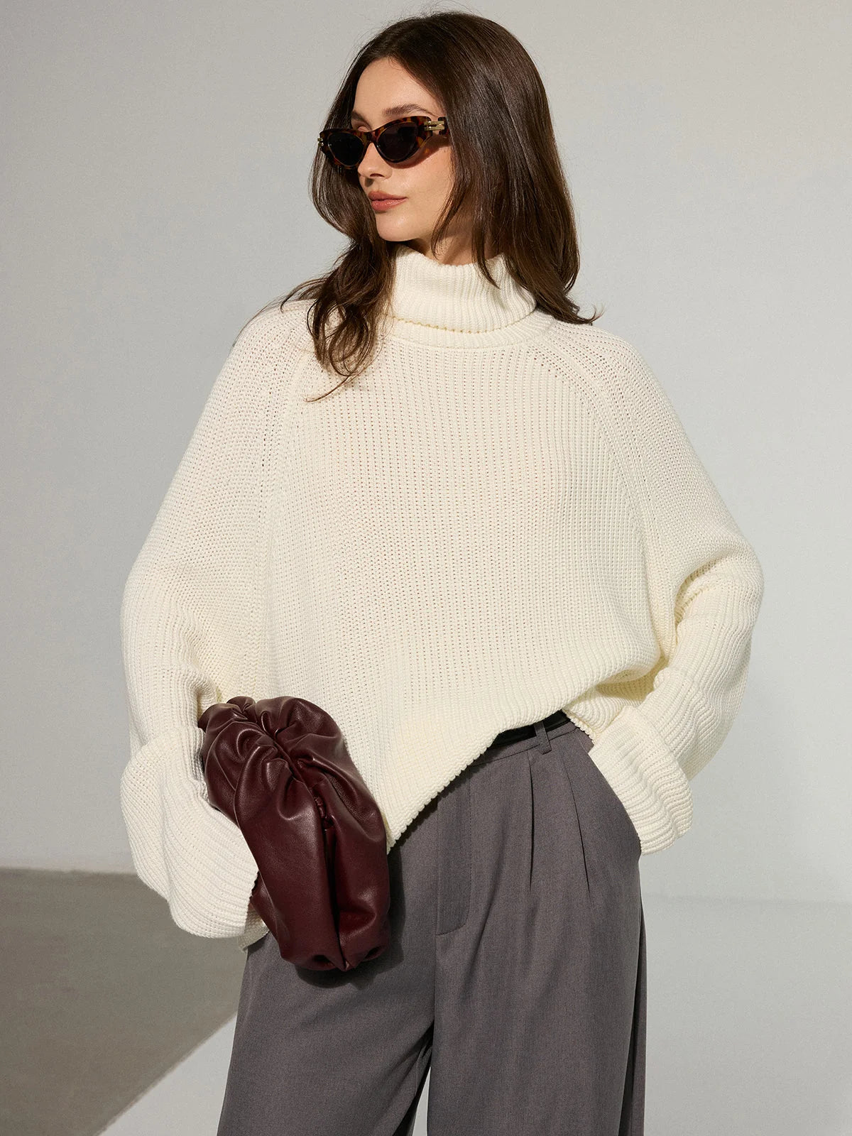 Women's Oversized Turtleneck Sweater with Open Back Detail 1