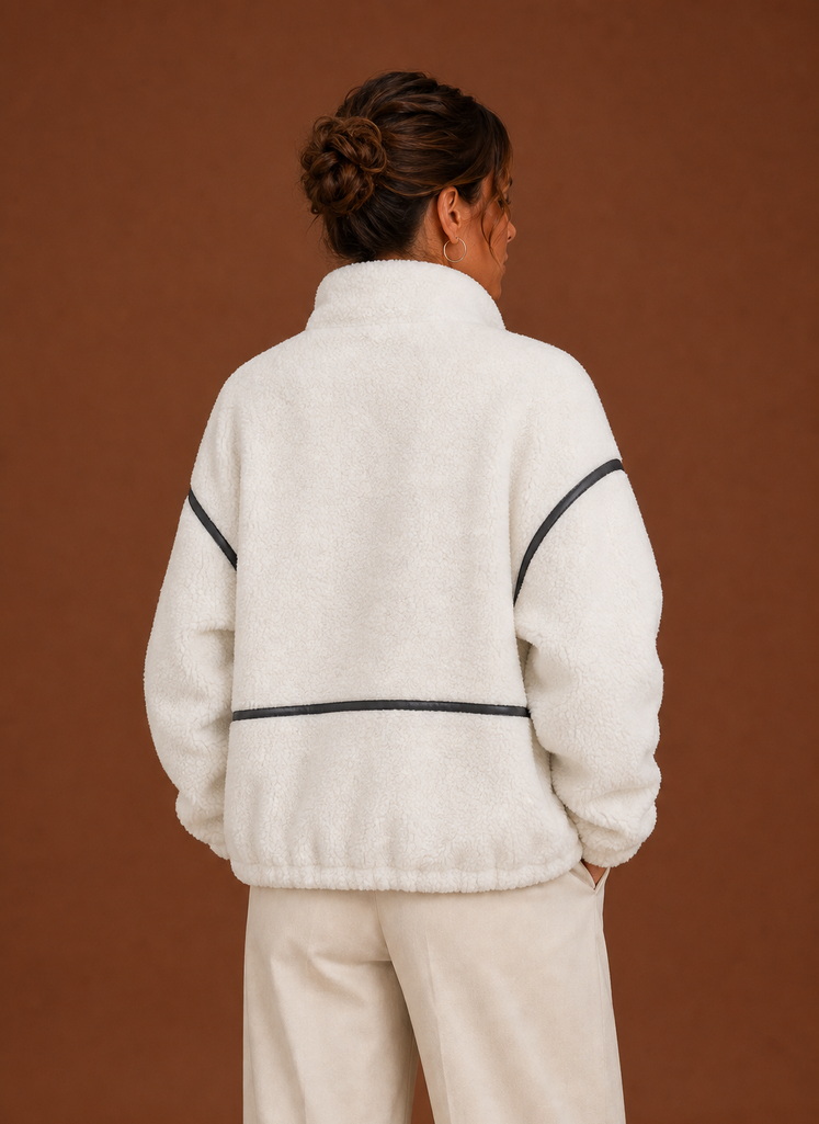 Women's Sherpa zip-up fleece jacket featuring cozy patch pockets, perfect for layering in cold weather. 7