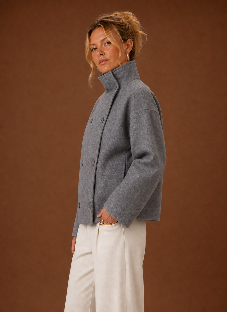 Women's tailored funnel neck jacket in a stylish design, perfect for versatile layering in any season, featuring a flattering fit and high-quality material. 2