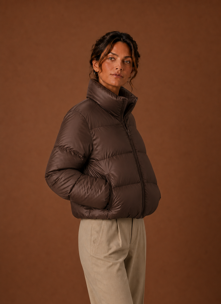 Women's tailored quilted puffer jacket in stylish design, perfect for fall and winter warmth and fashion. 1