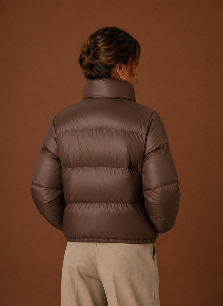 Women's tailored quilted puffer jacket in stylish design, perfect for fall and winter warmth and fashion. 2