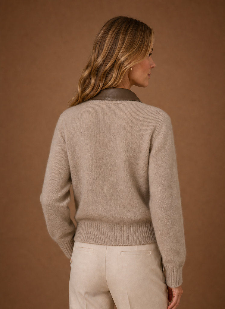 Women's zip knit jacket featuring a classic collar and relaxed fit, perfect for casual outings and layering in cooler weather. 2